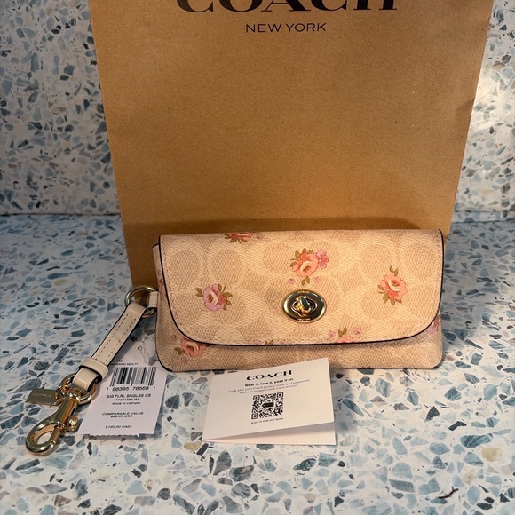 Coach Accessories - Coach Pink Floral Signature Turnlock sunglasses case